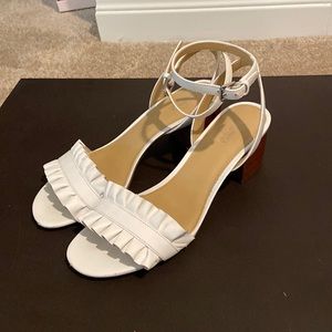 Michael Kors Sz 7.5 white leather ruffled ankle strap shoes.